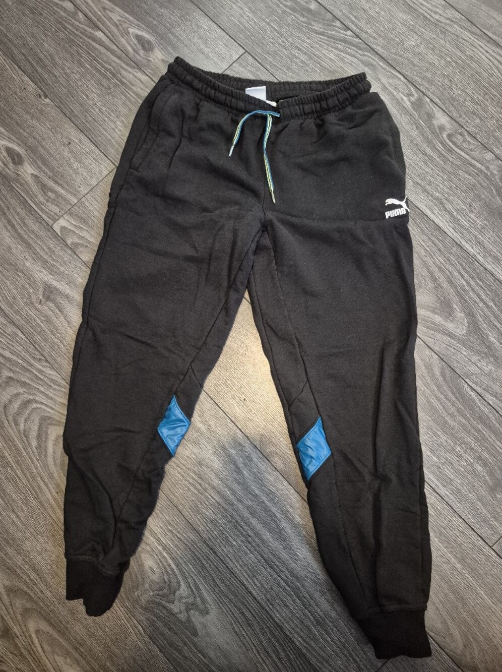 PUMA Mens Medium Joggers Black Blue Colorblock Quilted Knee Sweatpants NWOT